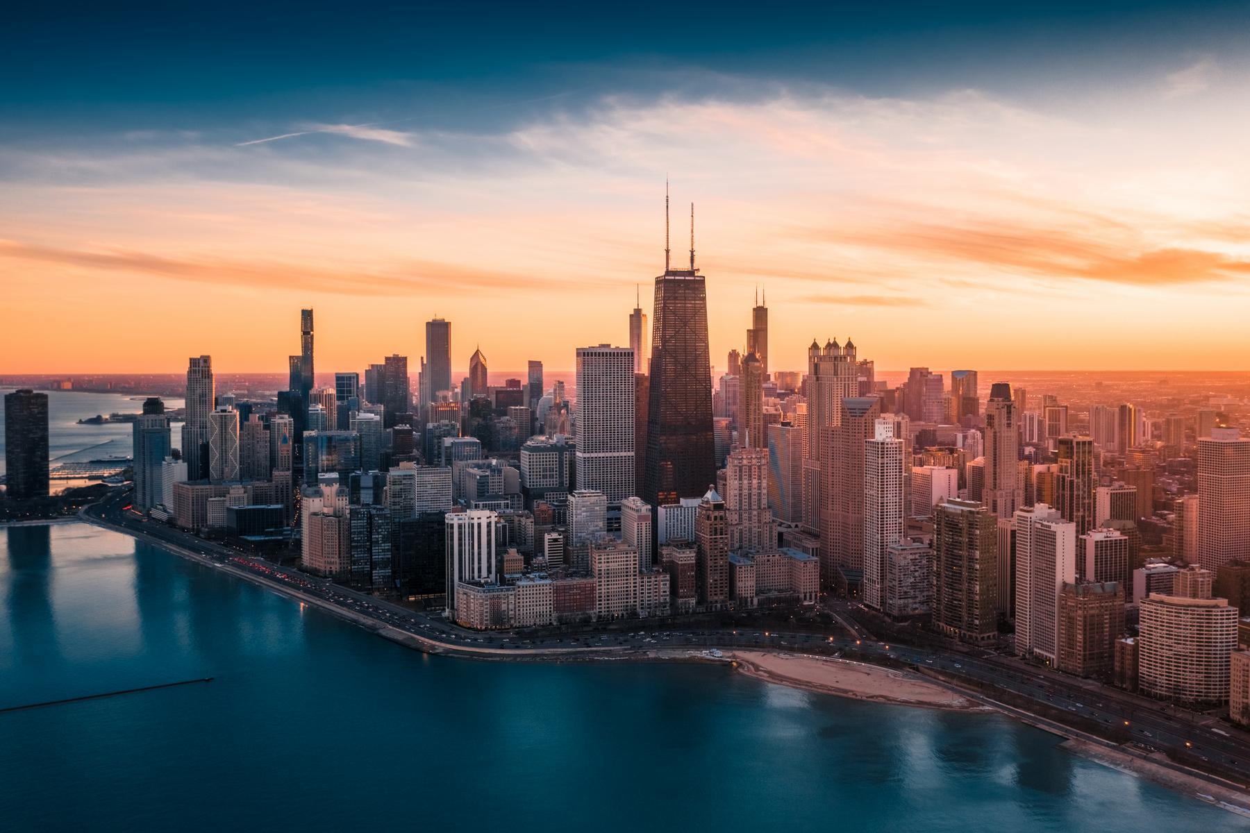 The Chicago skyline seen from above Lake Michigan at sunset