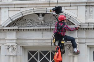 Rope access survey of a building with ornate terra cotta facade