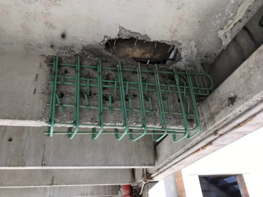 Repair of a failed precast double tee structural element in a parking structure