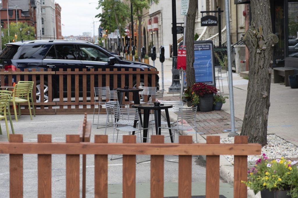 On-street parking spaces used for restaurant space in downtown Milwaukee