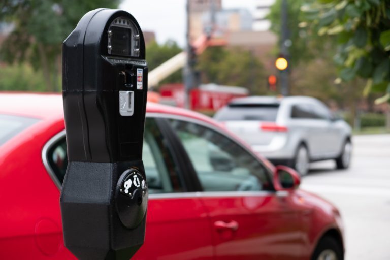 Parking meter near a busy street