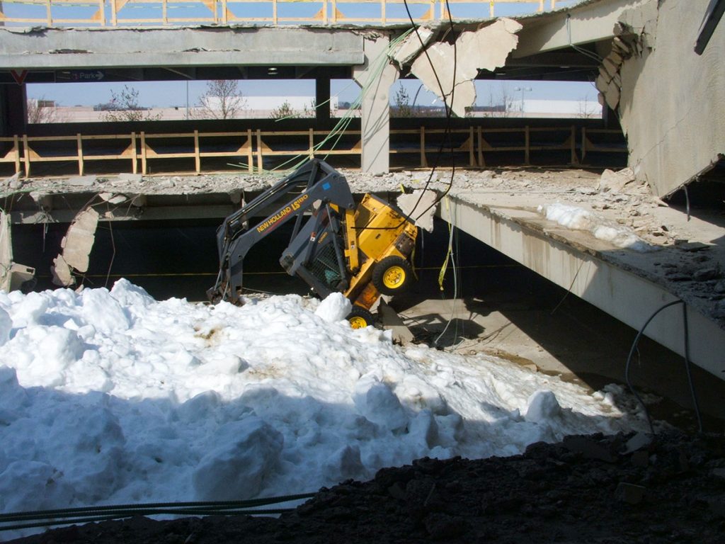 Parking structure collapsed under weight of collected snow